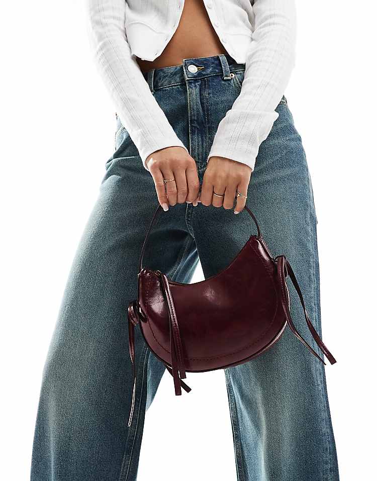https://images.asos-media.com/products/asos-design-half-moon-shoulder-bag-with-side-bow-detail-in-burgundy/206697413-2?$n_750w$&wid=750&fit=constrain