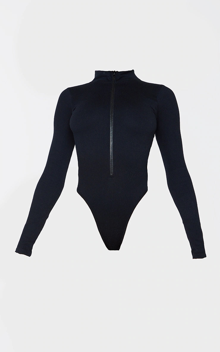 https://cdn-img.prettylittlething.com/7/0/8/3/708312144444e1e4a4ce80be59b5d99234106f69_CMT6658_5_black_contour_rib_zip_up_long_sleeve_bodysuit.jpg