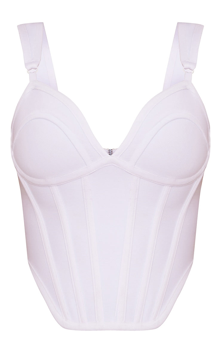 https://cdn-img.prettylittlething.com/8/d/0/9/8d09033e42f065d7c565377e929602c67a38b393_CMY3488_5_white_bandage_dip_hem_bust_cup_corset.jpg