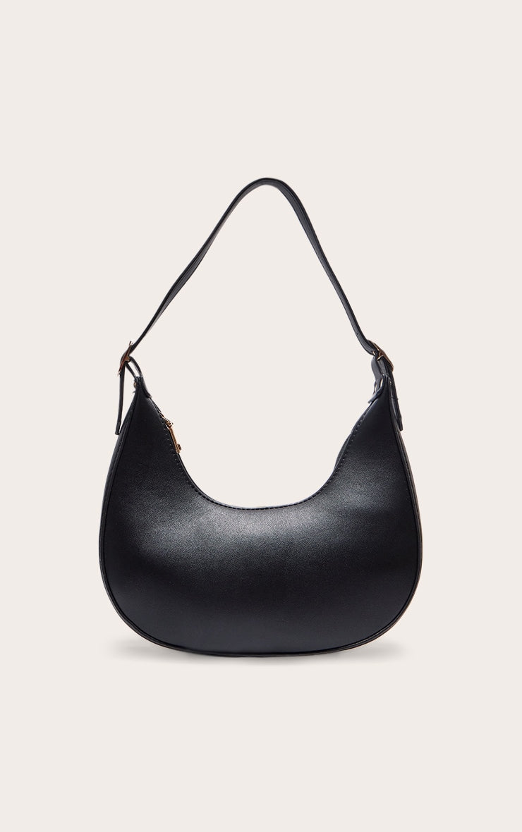 https://cdn-img.prettylittlething.com/b/2/2/e/b22e01fd23627861a68796c529526e02a4d0de85_CNA1617_3_black_curved_pu_shoulder_bag.jpg