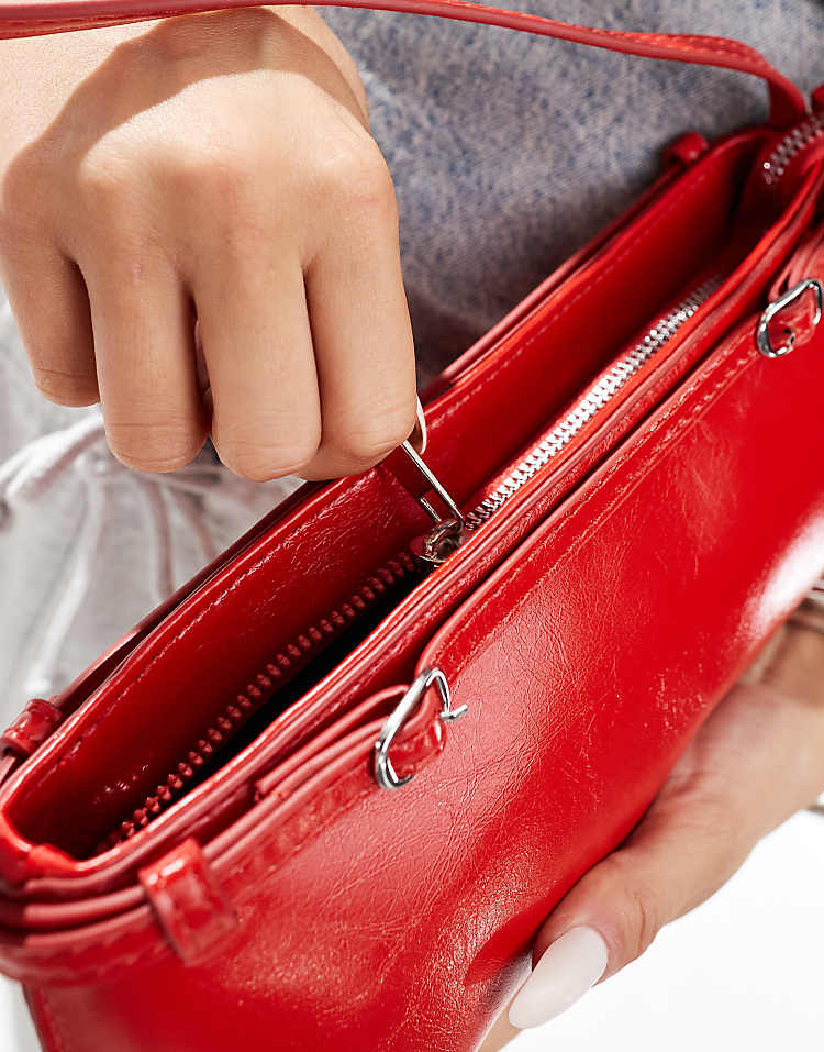 https://images.asos-media.com/products/asos-design-shoulder-bag-with-buckle-detail-in-red/205996951-2?$n_750w$&wid=750&fit=constrain