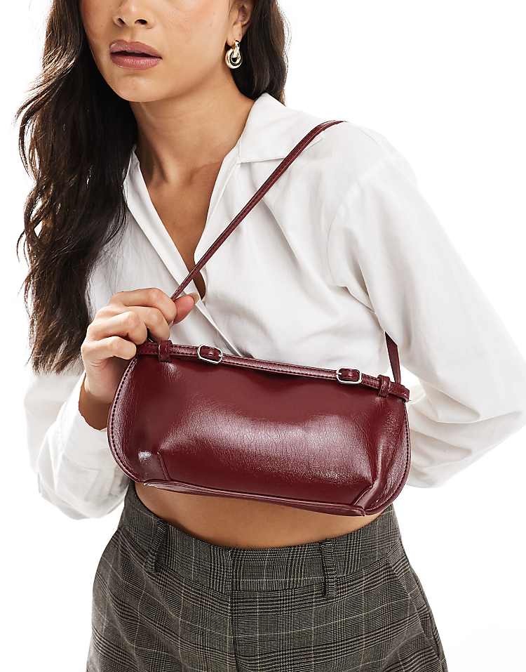 https://images.asos-media.com/products/asos-design-shoulder-bag-with-buckle-detail-in-burgundy/206930751-1-burgundy?$n_750w$&wid=750&fit=constrain
