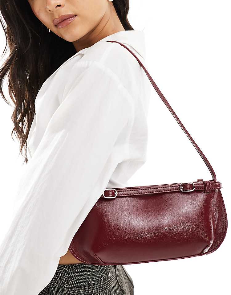 https://images.asos-media.com/products/asos-design-shoulder-bag-with-buckle-detail-in-burgundy/206930751-2?$n_750w$&wid=750&fit=constrain