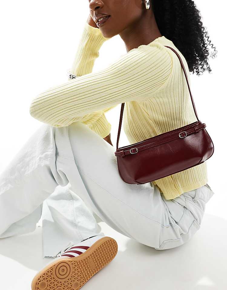 https://images.asos-media.com/products/asos-design-shoulder-bag-with-buckle-detail-in-burgundy/206956978-2?$n_750w$&wid=750&fit=constrain