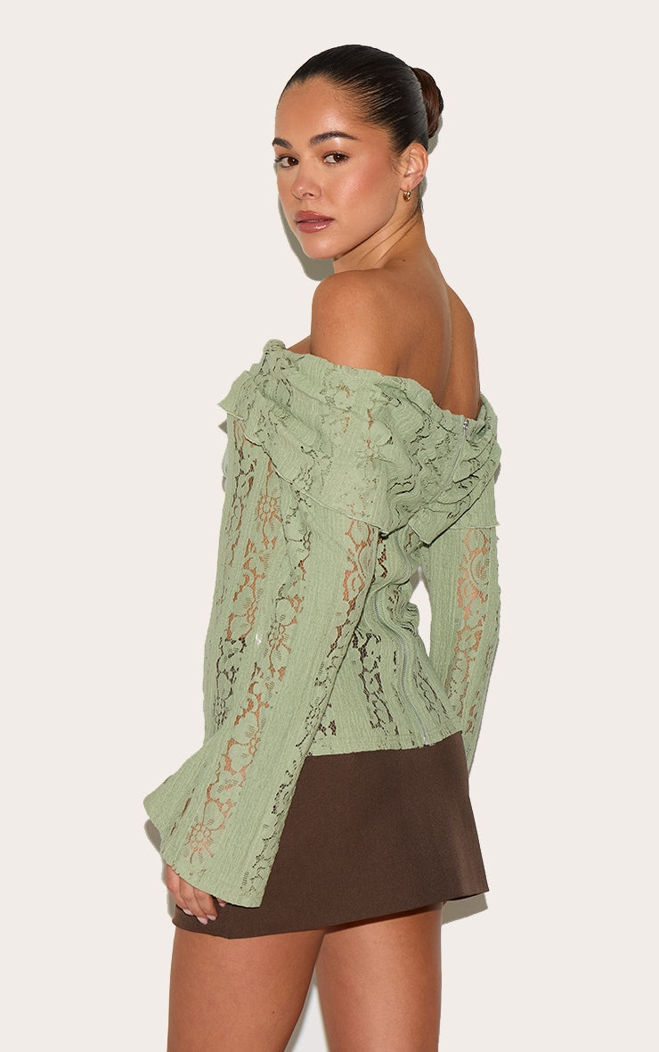 https://cdn-img.prettylittlething.com/4/6/7/a/467a2f7d5b4d16e319d1238dc4db212784180758_CNL9805_2_sage_fitted_lace_flared_sleeve_bardot_top.jpg