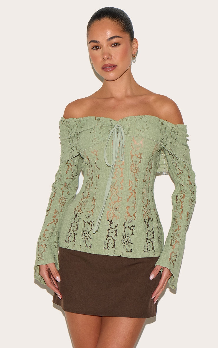 https://cdn-img.prettylittlething.com/8/e/f/f/8eff9af3714fbaa58f0d8836e00e6b00486f249c_CNL9805_1_sage_fitted_lace_flared_sleeve_bardot_top.jpg