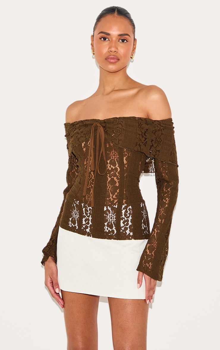 https://cdn-img.prettylittlething.com/c/c/b/3/ccb34738688a38ddc38d55adbbcc96f3d422c762_CNL7494_1_chocolate_fitted_lace_flared_sleeve_bardot_top.jpg