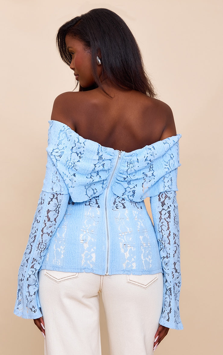 https://cdn-img.prettylittlething.com/f/8/2/4/f8243dd3c016e0e985f35649ed5d11b152c67528_CNN1295_2_sky_blue_fitted_lace_flared_sleeve_bardot_top.jpg